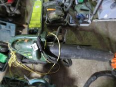 240VOLT LEAF VAC PLUS A PETROL CHAINSAW. EXECUTOR SALE. SOLD UNDER THE AUCTIONEERS MARGIN SCHEME THE