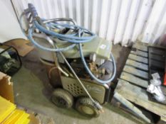 HEAVY DUTY 240 VOLT WHEELED STEAM CLEANER WITH HOSE AND LANCE.