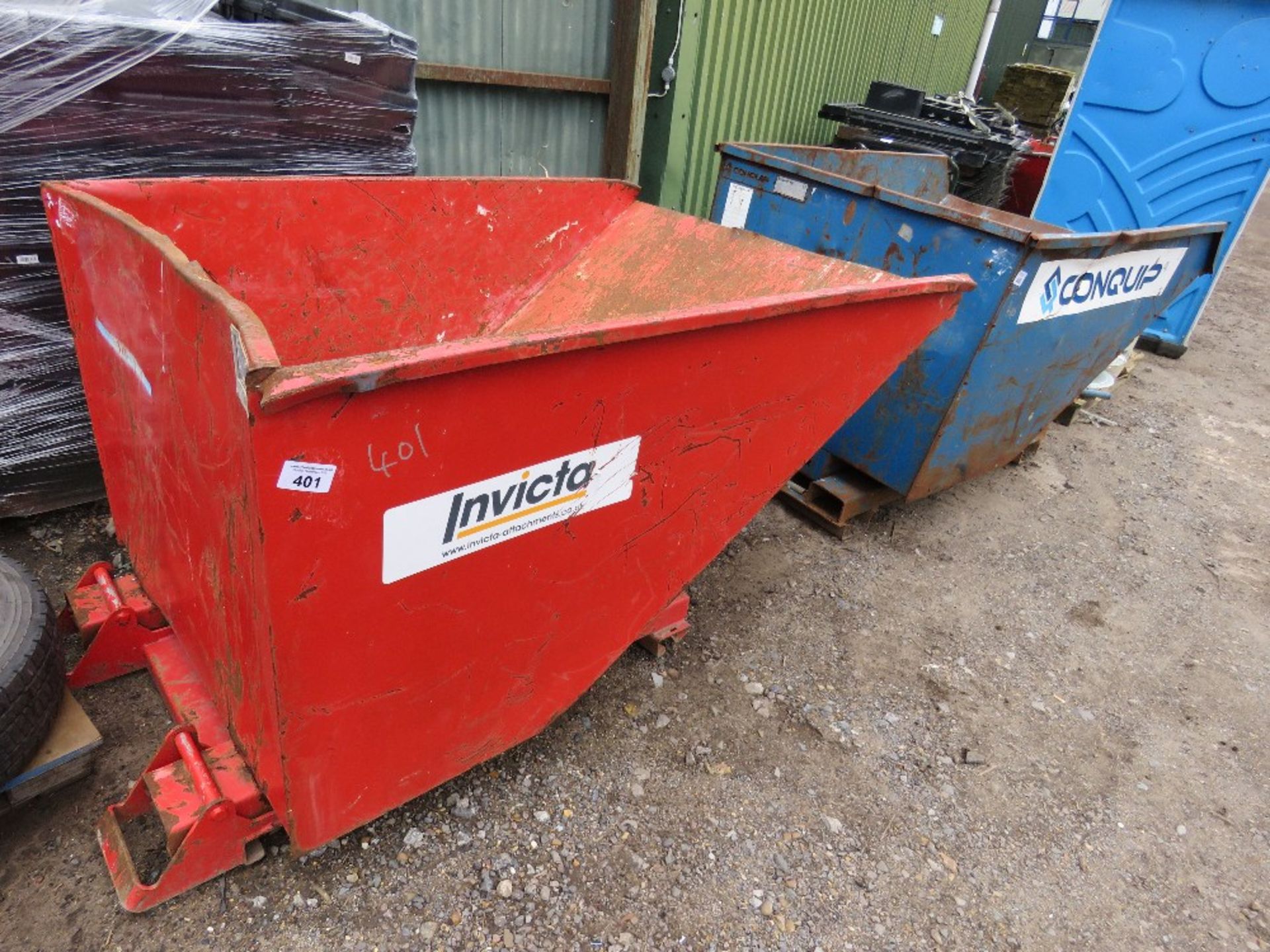 RED TELEHANDLER MOUNTED TIPPING SKIP.