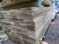 LARGE PACK OF PRESSURE TREATED FEATHER EDGE TIMBER FENCE CLADDING BOARDS. SIZE: 1.80M LENGTH X 1