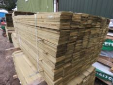 LARGE PACK OF PRESSURE TREATED FEATHER EDGE TIMBER FENCE CLADDING BOARDS. SIZE: 1.50M LENGTH X 1