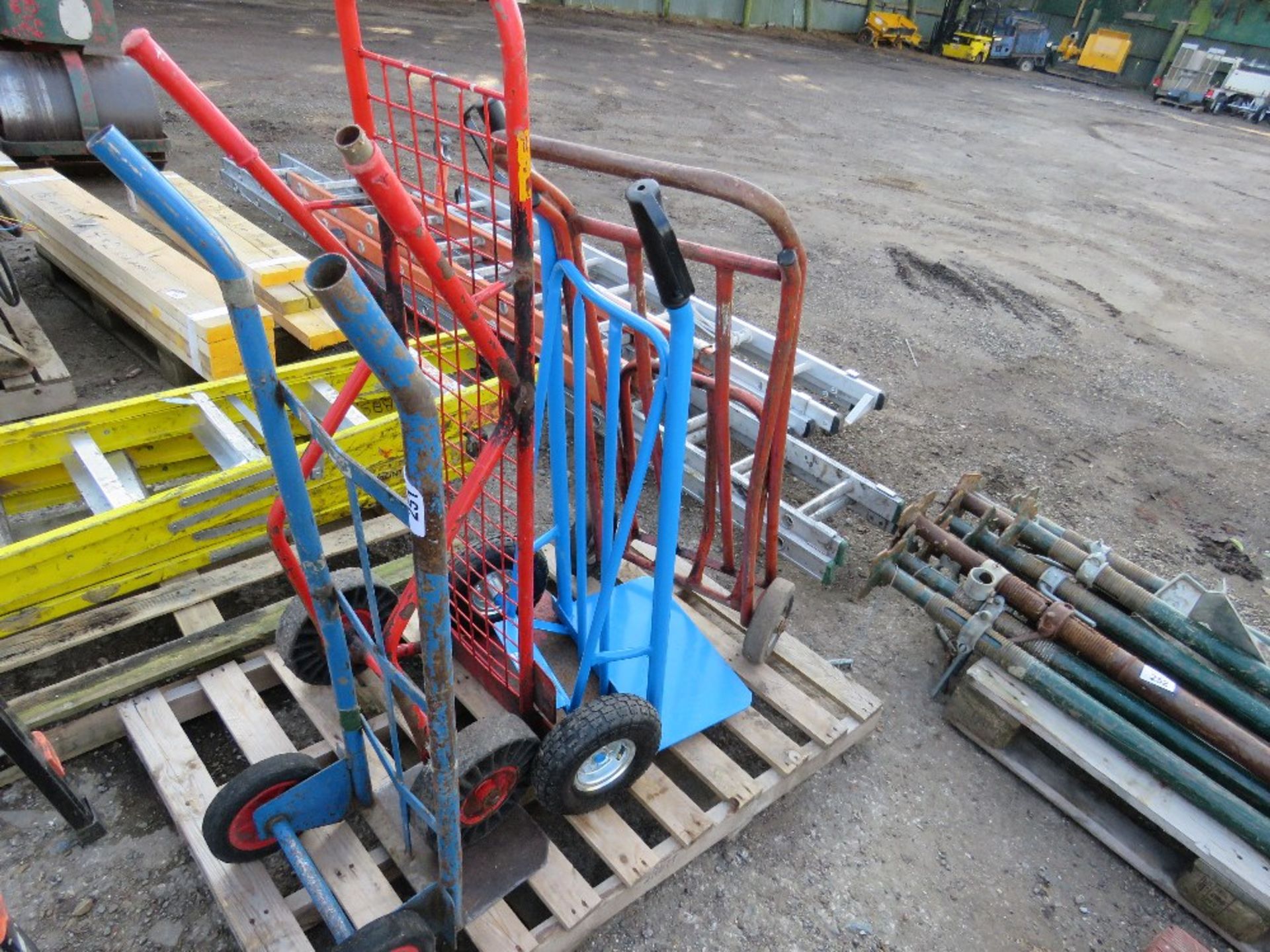 4 X METAL SACK BARROWS. THIS LOT IS SOLD UNDER THE AUCTIONEERS MARGIN SCHEME, THEREFORE NO VAT WILL