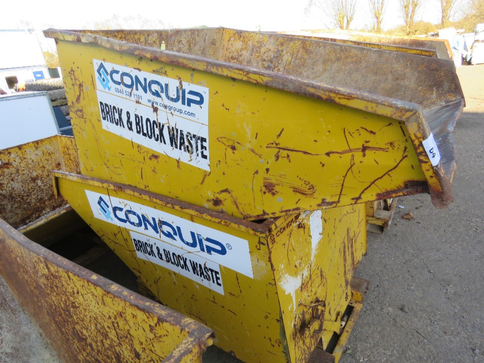 2 X CONQUIP FORKLIFT MOUNTED TIPPING SKIPS.