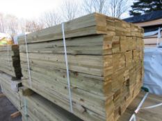 PACK OF FEATHER EDGE FENCE CLADDING TIMBER, PRESSURE TREATED. SIZE: 1.34M LENGTH, 100MM WIDTH APPROX