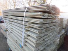 LARGE PACK OF TREATED SHIPLAP FENCE CLADDING TIMBER BOARDS. SIZE: 1.73M LENGTH X 10CM WIDTH APPROX.