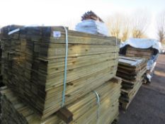 LARGE BUNDLE OF PRESSURE TREATED FEATHER EDGE TIMBER CLADDING: 1.5M LENGTH X 10CM WIDTH APPROX.
