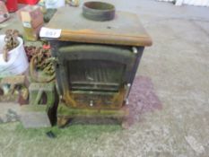 WOOD BURNING STOVE. NO VAT CHARGED ON THE HAMMER PRICE OF THIS LOT.