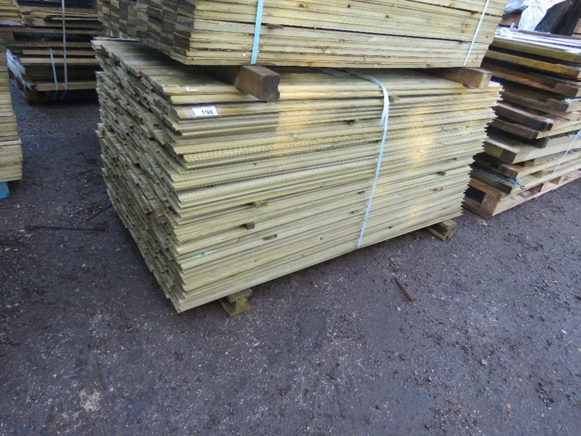 LARGE BUNDLE OF PRESSURE TREATED SHIPLAP TIMBER CLADDING: 1.72M LENGTH X 10CM WIDTH APPROX.