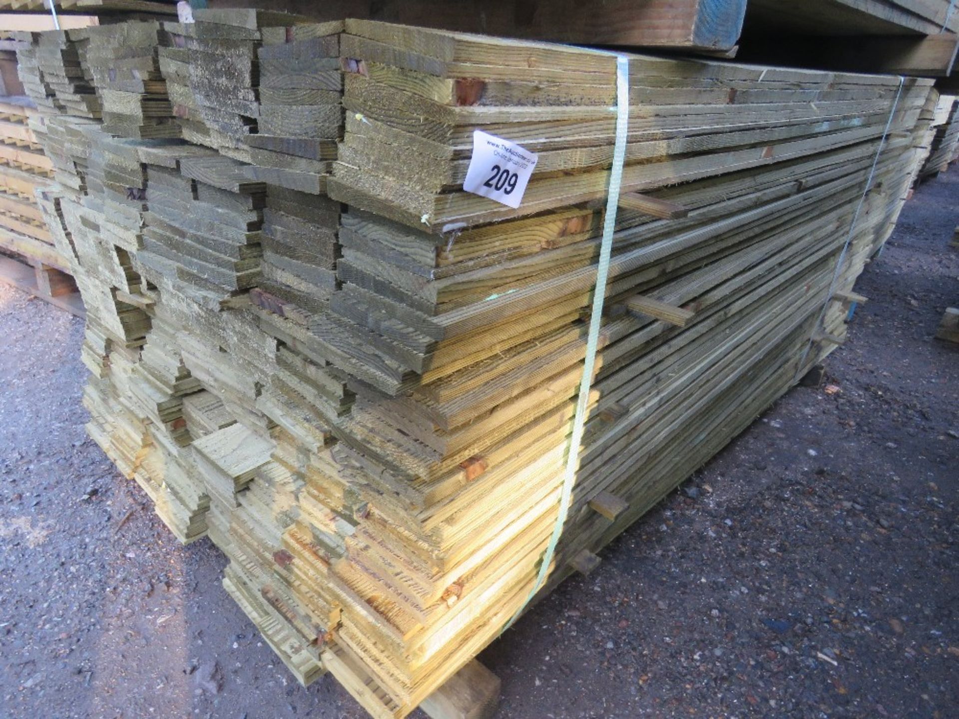 LARGE BUNDLE OF PRESSURE TREATED FEATHER EDGE TIMBER CLADDING: 1.65M LENGTH X 10CM WIDTH APPROX.