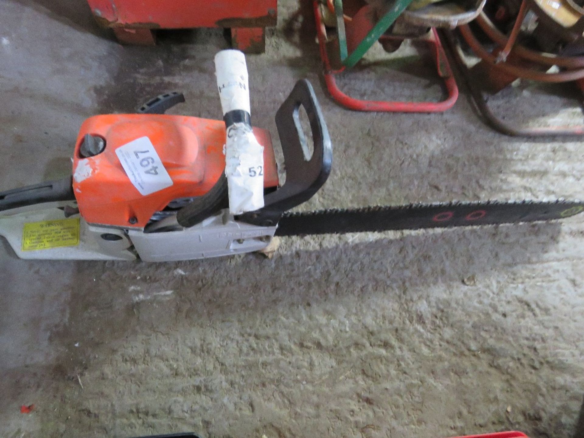 PETROL ENGINED CHAINSAW WITH INSTRUCTIONS.