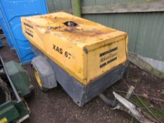 ATLAS COPCO XAS67 TOWED ROAD COMPRESSOR, YEAR 2004. WHEN TESTED WAS SEEN TO RUN AND MAKE AIR (BATTER