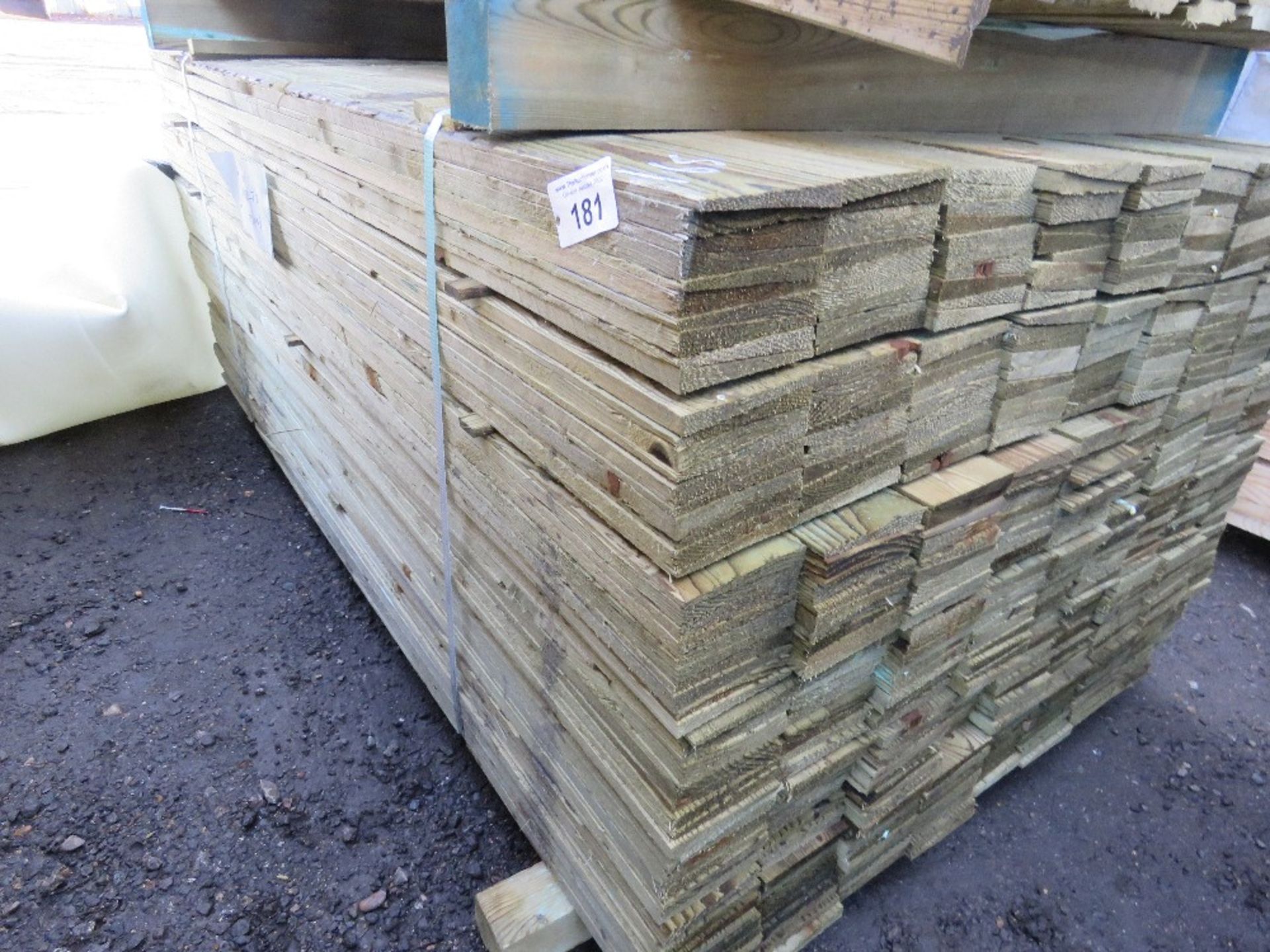 LARGE BUNDLE OF PRESSURE TREATED FEATHER EDGE TIMBER CLADDING: 1.65M LENGTH X 10CM WIDTH APPROX.