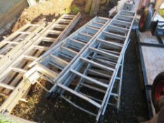 PALLET CONTAINING A 2 STAGE LADDER PLUS 3 X ASSORTED LADDER SECTIONS.