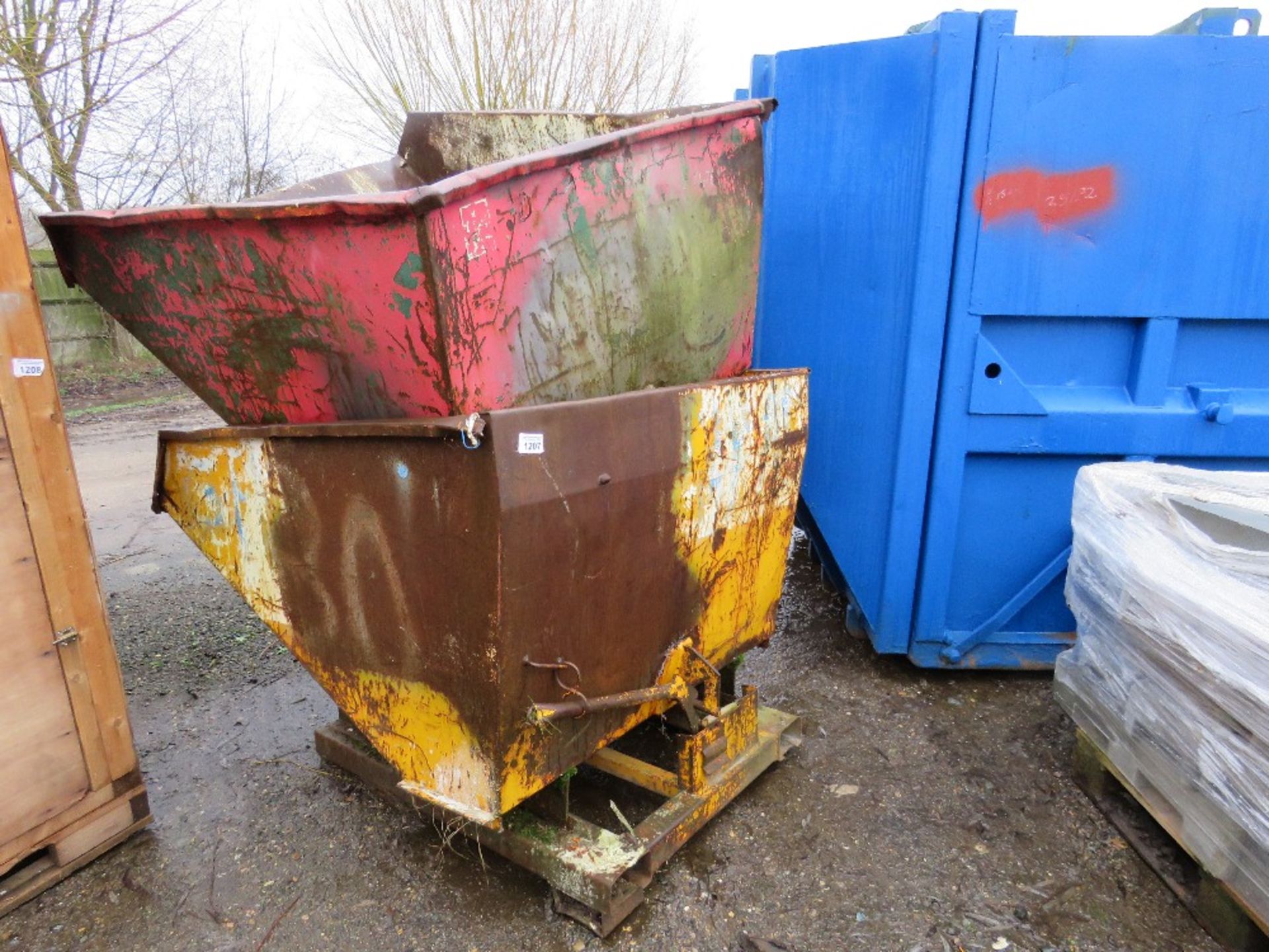 2 X FORKLIFT MOUNTED TIPPING SKIPS, YELLOW AND RED. THIS LOT IS SOLD UNDER THE AUCTIONEERS MARGIN SC