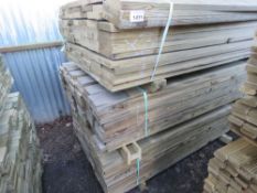 LARGE STACK OF TREATED TIMBER BOARDS 1.83M LENGTH X 140MM X 30MM APPROX. 259 IN TOTAL APPROX.
