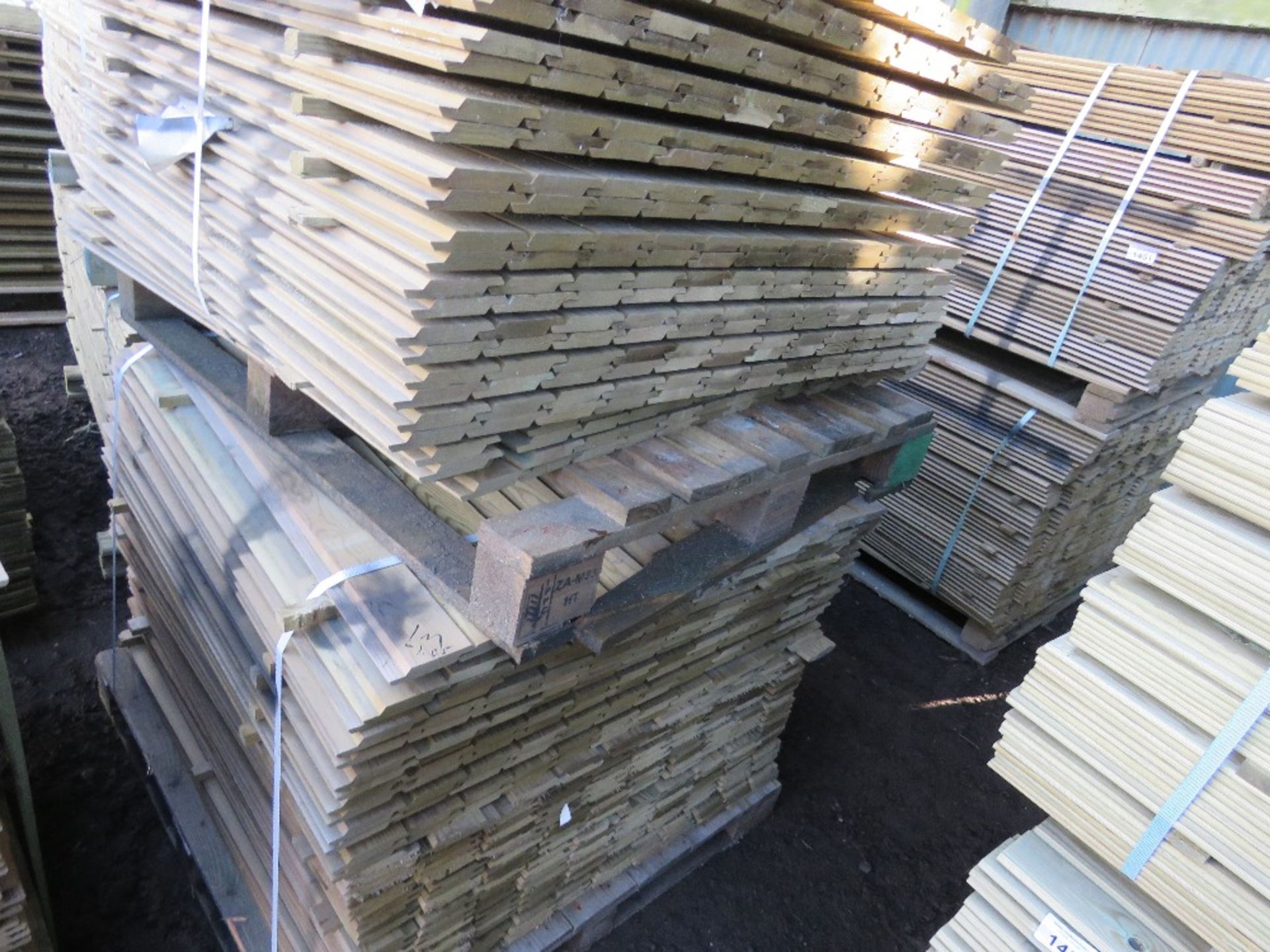 2 X PALLETS OF SHIPLAP PRESSURE TREATED FENCE CLADDING TIMBER BOARDS. 1.M-1.05M LENGTH X 95MM WIDTH