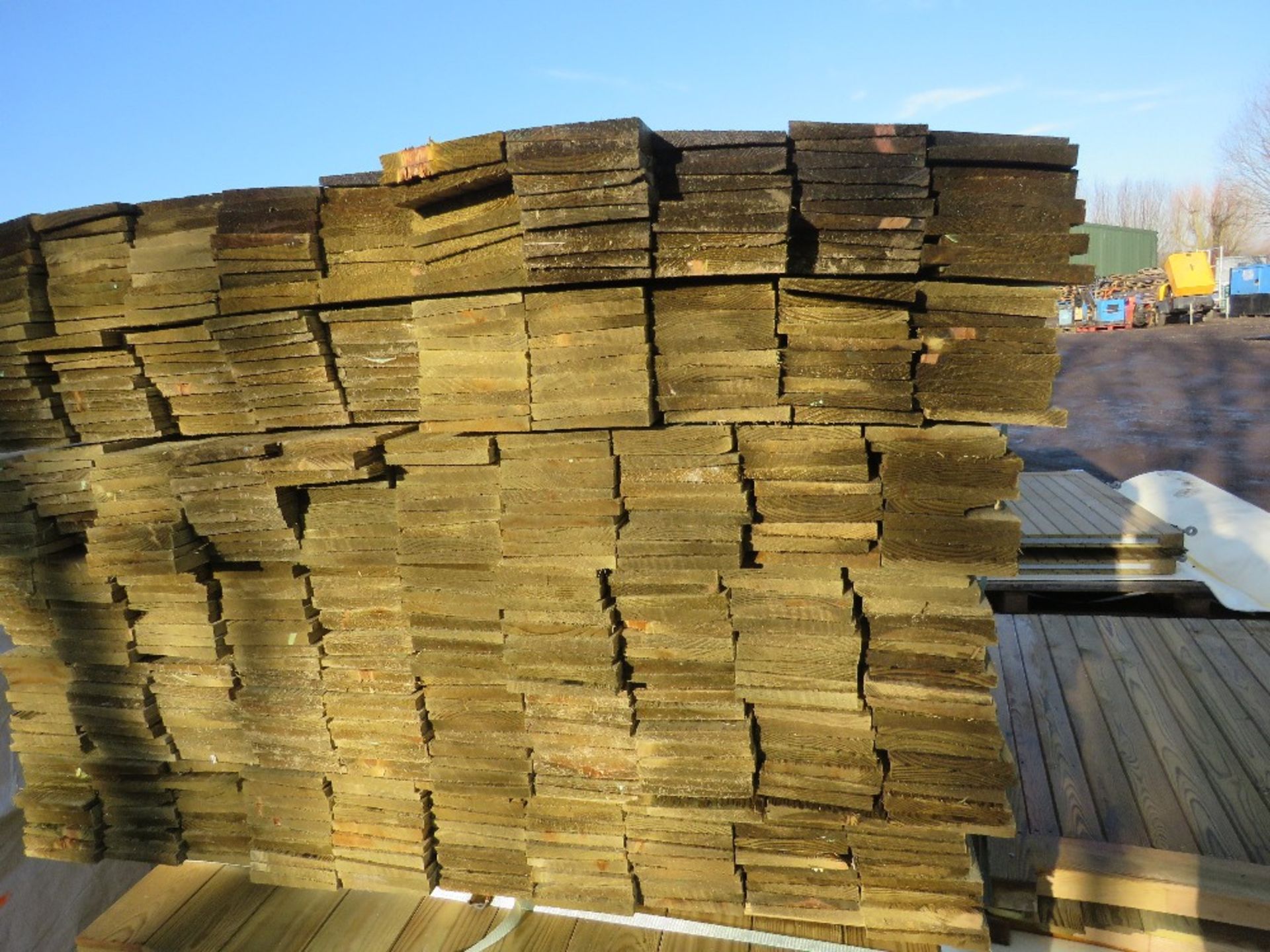 LARGE BUNDLE OF PRESSURE TREATED FEATHER EDGE TIMBER CLADDING: 1.65M LENGTH X 10CM WIDTH APPROX. - Image 2 of 3