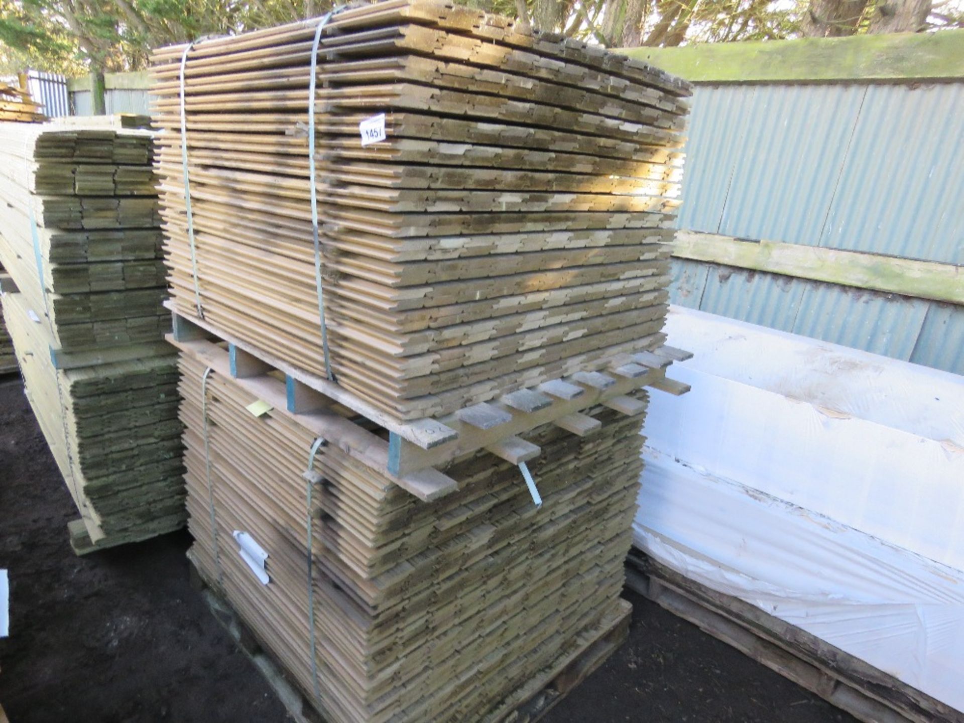 2 X PALLETS OF SHIPLAP PRESSURE TREATED FENCE CLADDING TIMBER BOARDS. 1.02M LENGTH X 95MM WIDTH APP