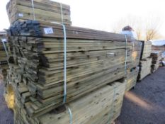 LARGE BUNDLE OF PRESSURE TREATED FEATHER EDGE TIMBER CLADDING: 1.8M LENGTH X 10CM WIDTH APPROX.