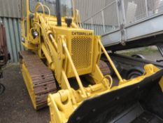 CATERPILLAR TRACKED LOADING SHOVEL. THIS LOT IS SOLD UNDER THE AUCTIONEERS MARGIN SCHEME, THEREFORE