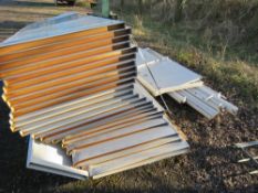 STACK OF METAL SECTIONAL OFFICE CONSTRUCTING PANELS. 0.9M WIDE X 2.75M HEIGHT APPROX