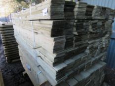 LARGE PACK OF FEATHER EDGE PRESSURE TREATED FENCE CLADDING TIMBER BOARDS. 1.8M LENGTH X 100MM WIDTH