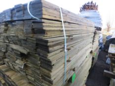 LARGE BUNDLE OF PRESSURE TREATED FEATHER EDGE TIMBER CLADDING: 1.65M LENGTH X 10CM WIDTH APPROX.