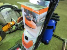 STIHL PRESSURE WASHER WITH LANCE AND A SCRUBBER HEAD.