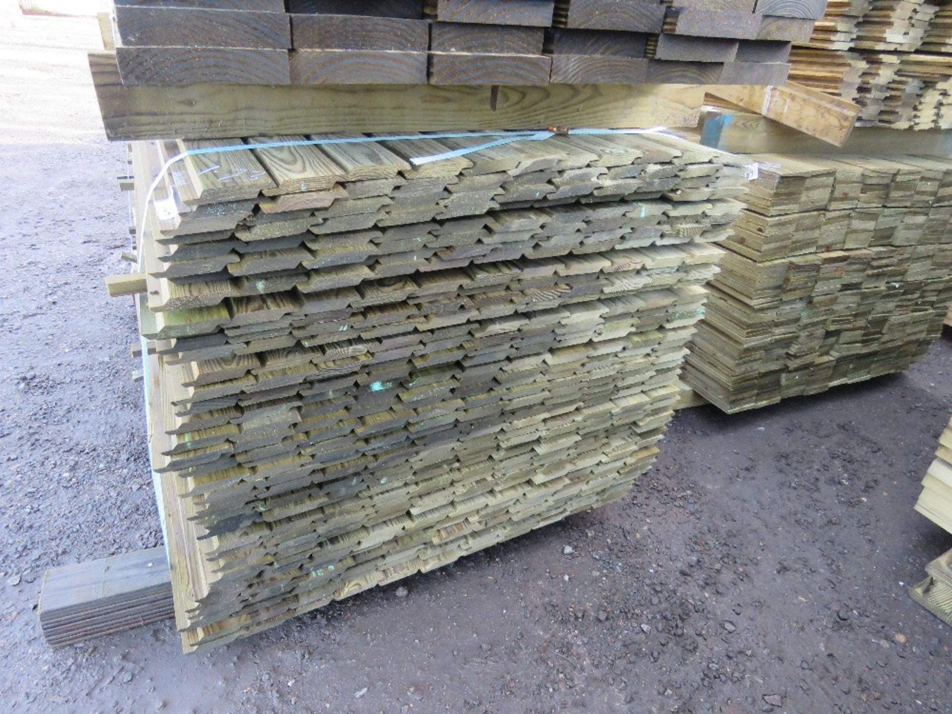 LARGE BUNDLE OF PRESSURE TREATED SHIPLAP TIMBER CLADDING: 1.73M LENGTH X 95MM WIDTH APPROX. - Image 2 of 3