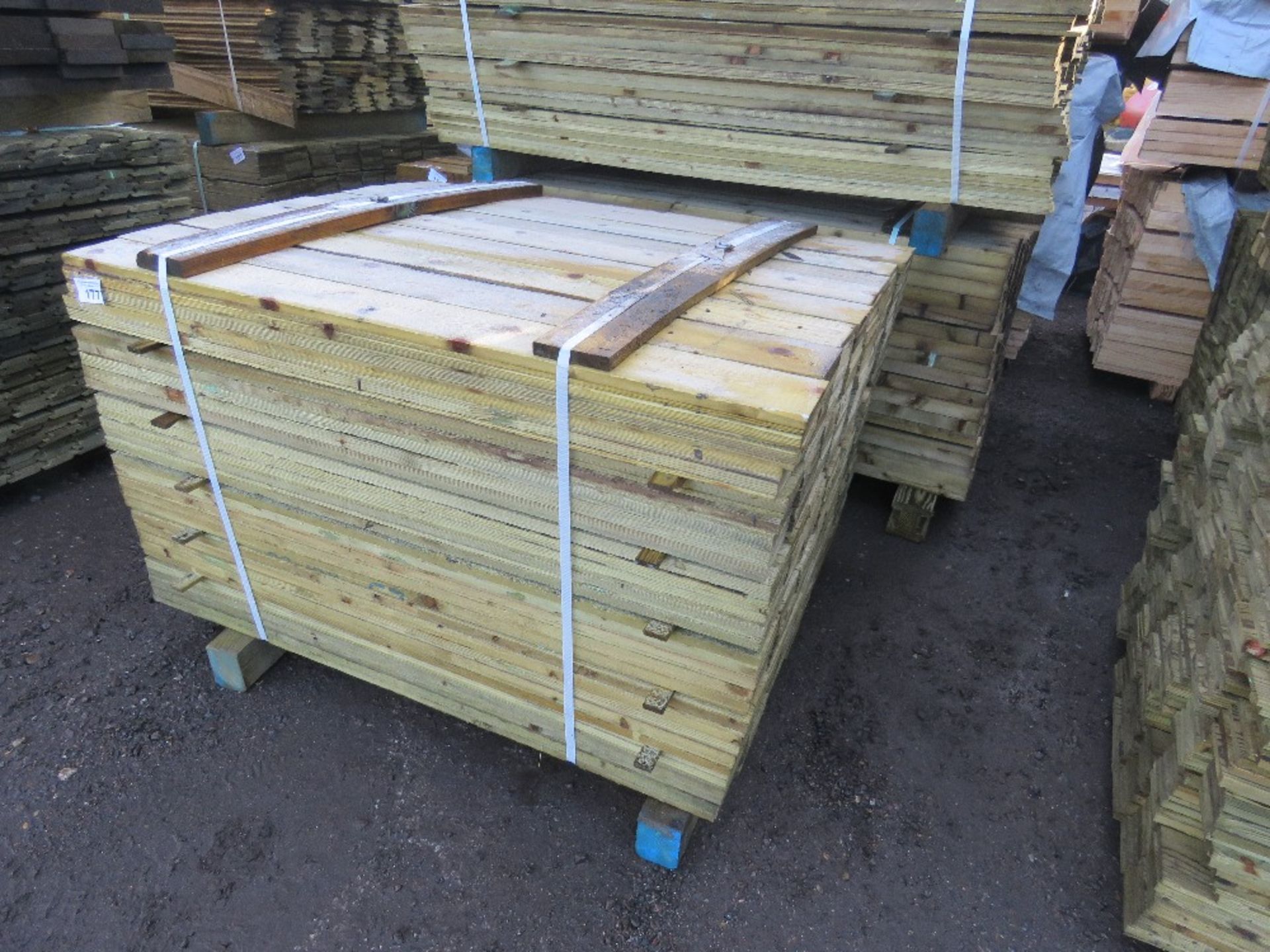 LARGE BUNDLE OF PRESSURE TREATED FEATHER EDGE TIMBER CLADDING: 1.2M LENGTH X 10CM WIDTH APPROX.