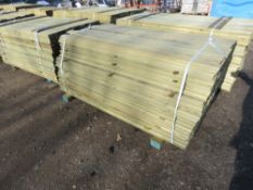 LARGE PACK OF PRESSURE TREATED SHIPLAP CLADDING TIMBER. LENGTH 1.73M X 100MM WIDTH APPROX.