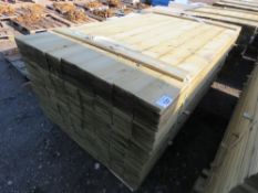 LARGE PACK OF PRESSURE TREATED FEATHER EDGE CLADDING TIMBER. LENGTH 1.8M X 100MM WIDTH APPROX.