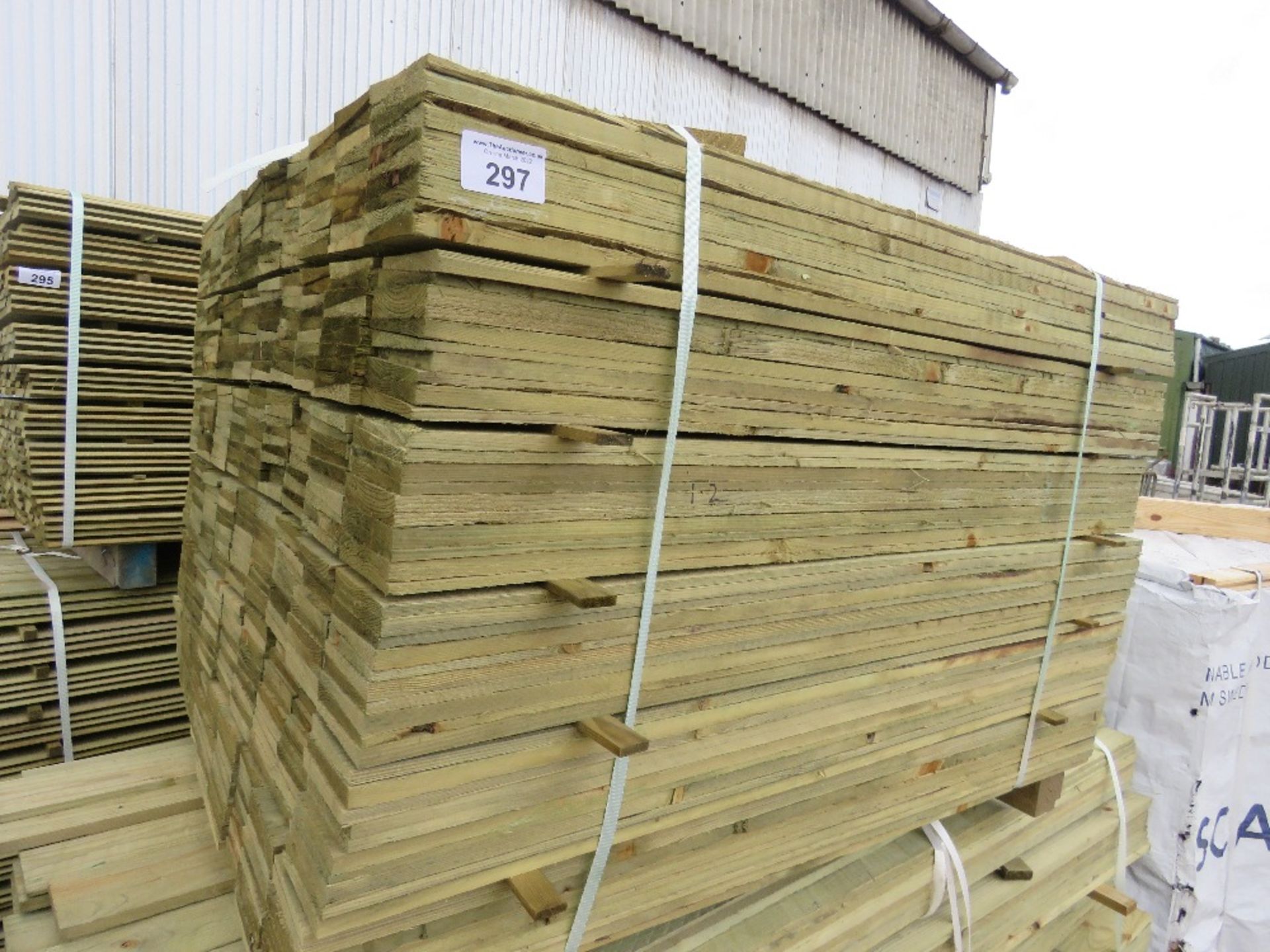 PACK OF TREATED FEATHER EDGE TIMBER FENCE CLADDING, 1.2M LENGTH X 105MM WIDTH APPROX.