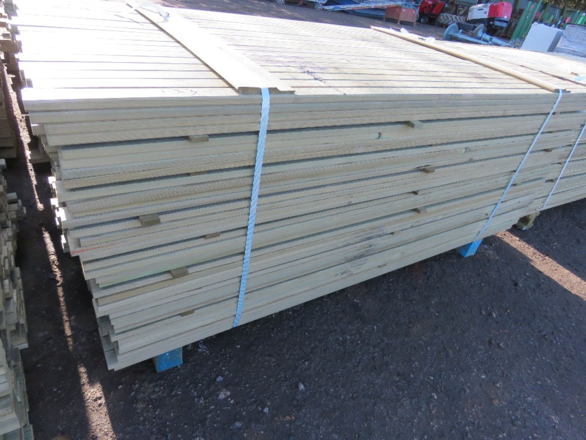 LARGE PACK OF PRESSURE TREATED VENETIAN CLADDING TIMBER SLATS. LENGTH 1.83M X 45MM WIDTH X 17MM DEPT