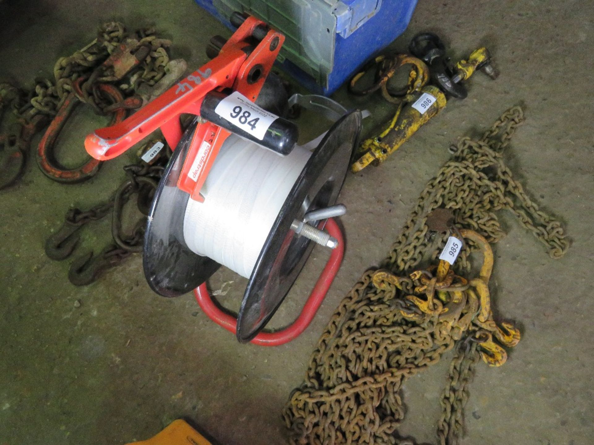 BANDING RIBBON ON A STAND PLUS A SET OF PLIERS. THIS LOT IS SOLD UNDER THE AUCTIONEERS MARGIN SCHEME