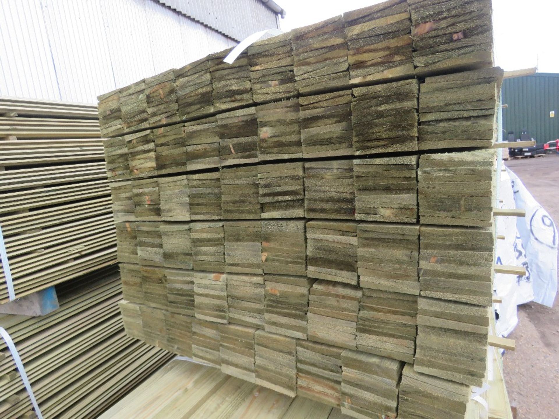 PACK OF TREATED FEATHER EDGE TIMBER FENCE CLADDING, 1.2M LENGTH X 105MM WIDTH APPROX. - Image 2 of 3