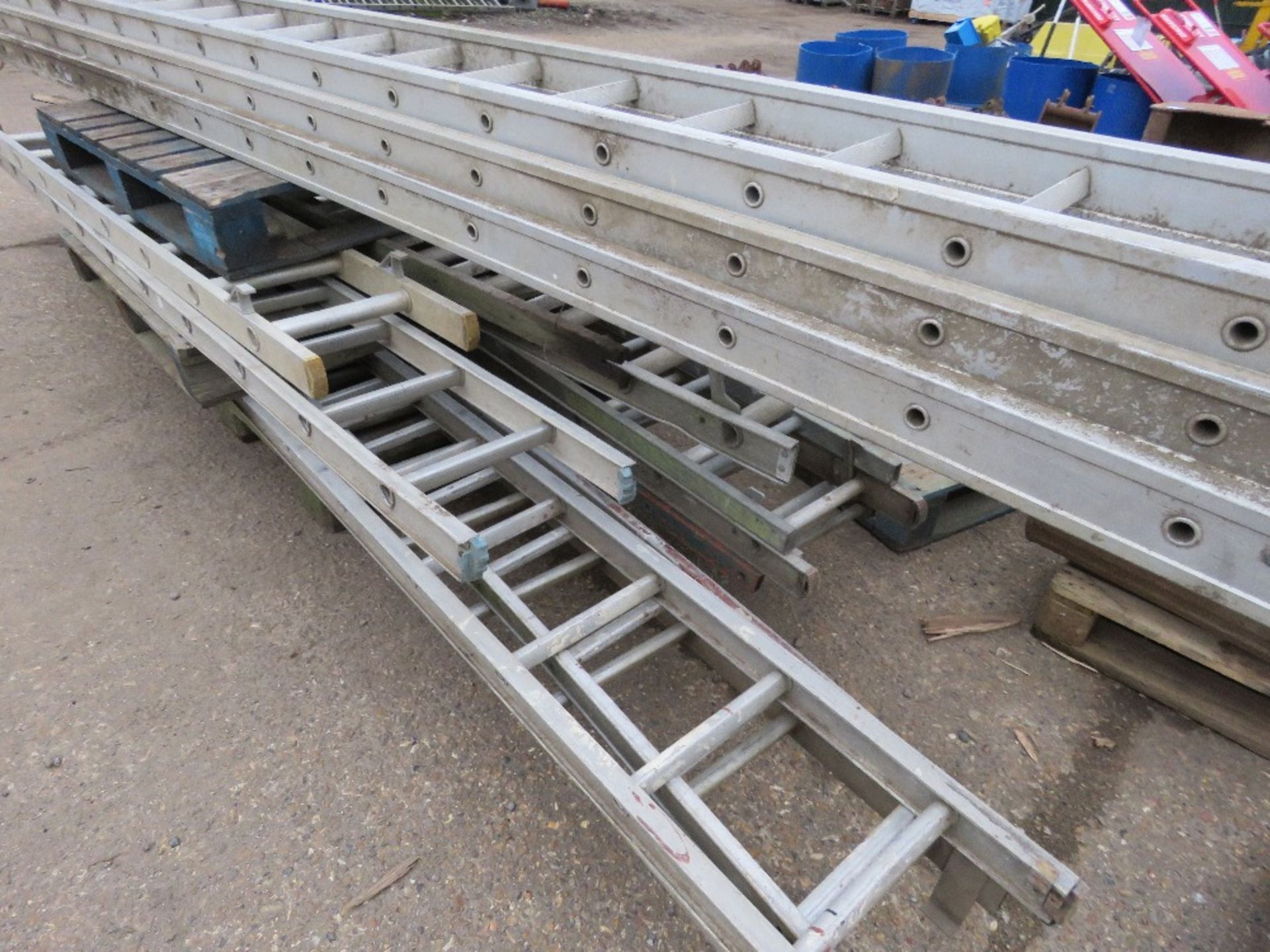 STACK OF ASSORTED LADDERS/LADDER SECTIONS, INCLUDING LARGE TRIPLE STAGE ALI LADDER. - Image 4 of 4