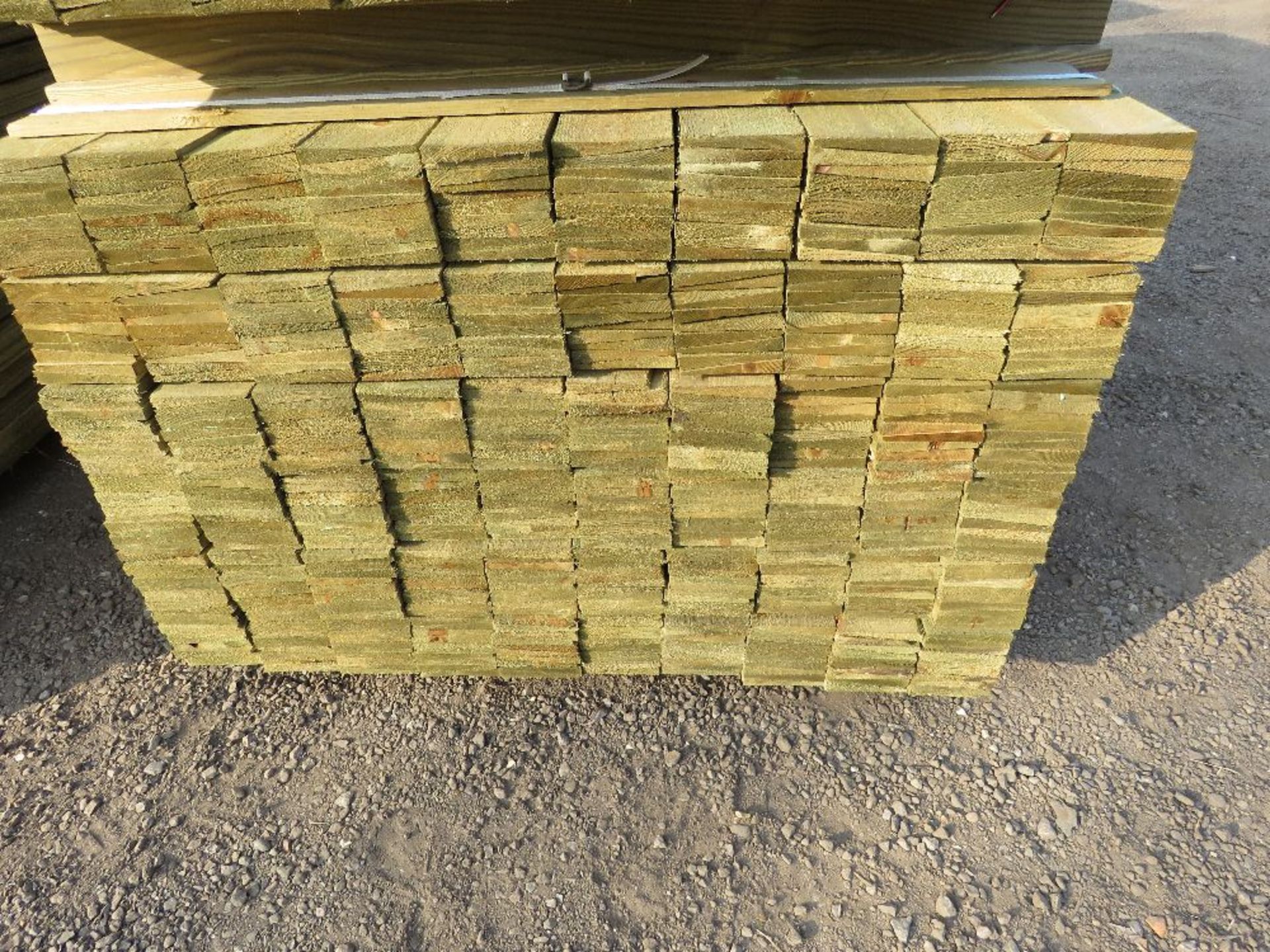 LARGE PACK OF PRESSURE TREATED FEATHER EDGE FENCE CLADDING BOARDS. 1.5M LENGTH X 100MM WIDTH APPROX. - Image 2 of 3