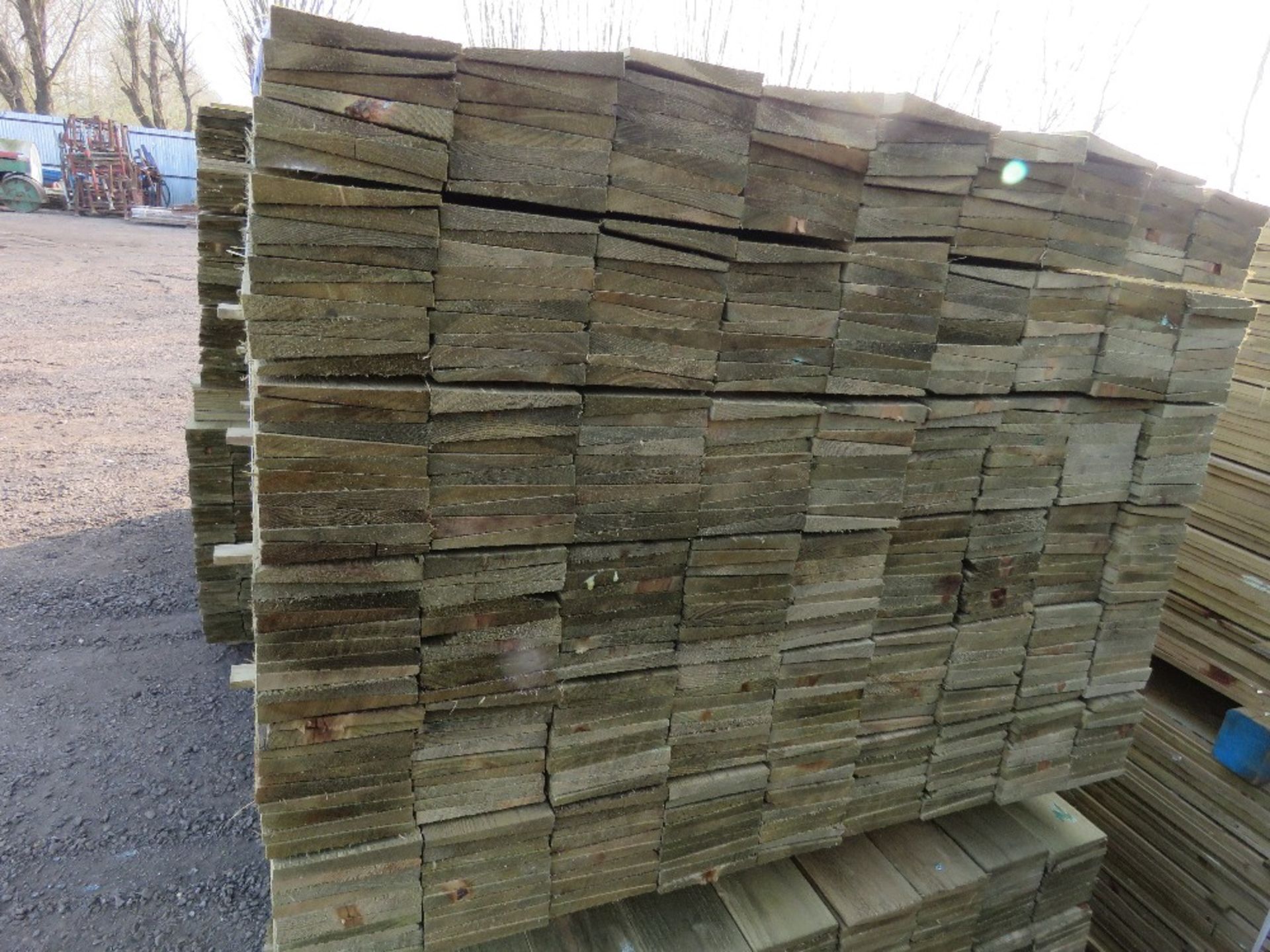 LARGE PACK OF PRESSURE TREATED FEATHER EDGE FENCE CLADDING BOARDS. 1.65M LENGTH X 100MM WIDTH APPROX - Image 2 of 4
