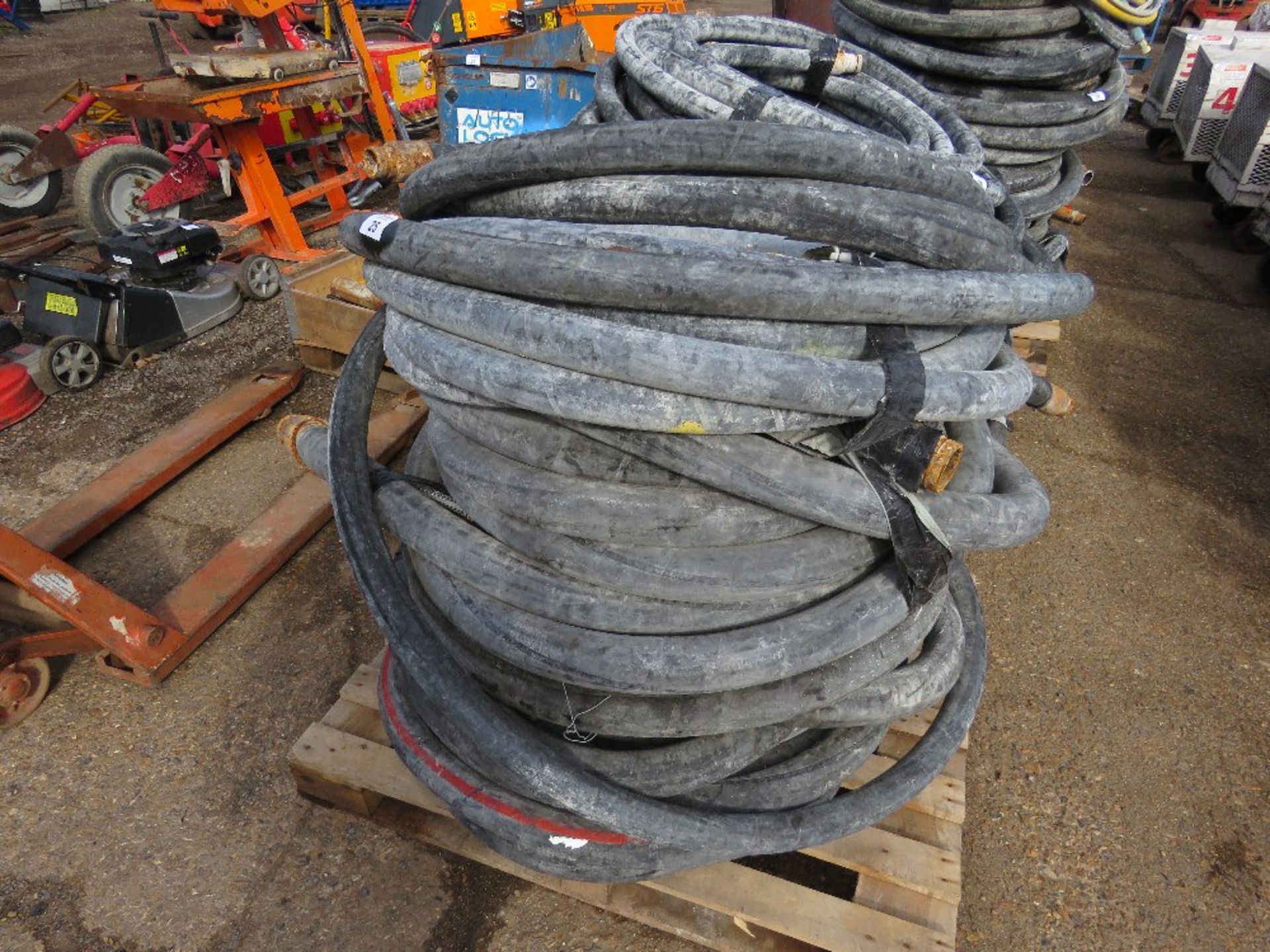 PALLET OF LARGE SIZED RUBBER SCREED PUMPING HOSES, MAINLY 60-70MM DIAMETER. SOURCED FROM DEPOT CLEAR