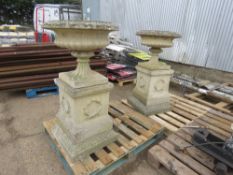 2 X LARGE DECORATIVE GARDEN URNS ON STANDS.