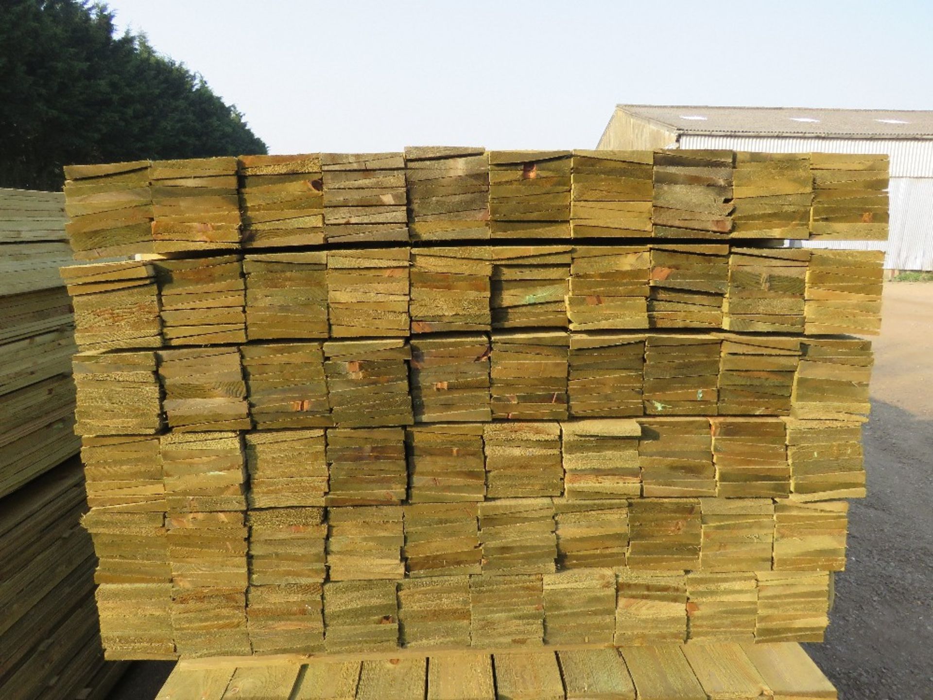 LARGE PACK OF PRESSURE TREATED FEATHER EDGE FENCE CLADDING BOARDS. 1.5M LENGTH X 100MM WIDTH APPROX. - Image 2 of 3