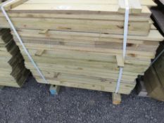 PACK OF PRESSURE TREATED FEATHER EDGE FENCE CLADDING BOARDS. 0.9M LENGTH X 100MM WIDTH APPROX.