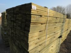 LARGE PACK OF PRESSURE TREATED FEATHER EDGE FENCE CLADDING BOARDS. 1.65M LENGTH X 100MM WIDTH APPROX