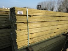 LARGE PACK OF PRESSURE TREATED HIT AND MISS FENCE CLADDING BOARDS. 1.75M LENGTH X 95MM WIDTH APPROX.