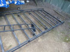 RHINO ROOF RACK AND LADDER FROM REALY VAN YEAR 2018. THIS LOT IS SOLD UNDER THE AUCTIONEERS MARGIN S