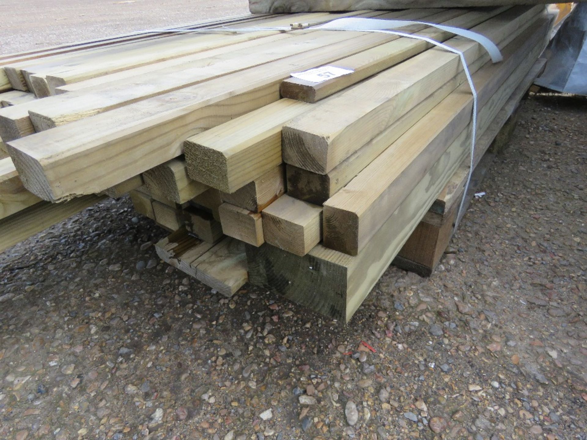 SMALL BUNDLE OF ASSORTED TREATED FENCING TIMBER 1.83M - 2.4M LENGTH APPROX.