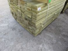 LARGE PACK OF PRESSURE TREATED FEATHER EDGE FENCE CLADDING BOARDS. 1.5M LENGTH X 100MM WIDTH APPROX.