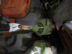 STIHL STRAIGHT SHAFT PETROL STRIMMER. THIS LOT IS SOLD UNDER THE AUCTIONEERS MARGIN SCHEME, THEREFOR