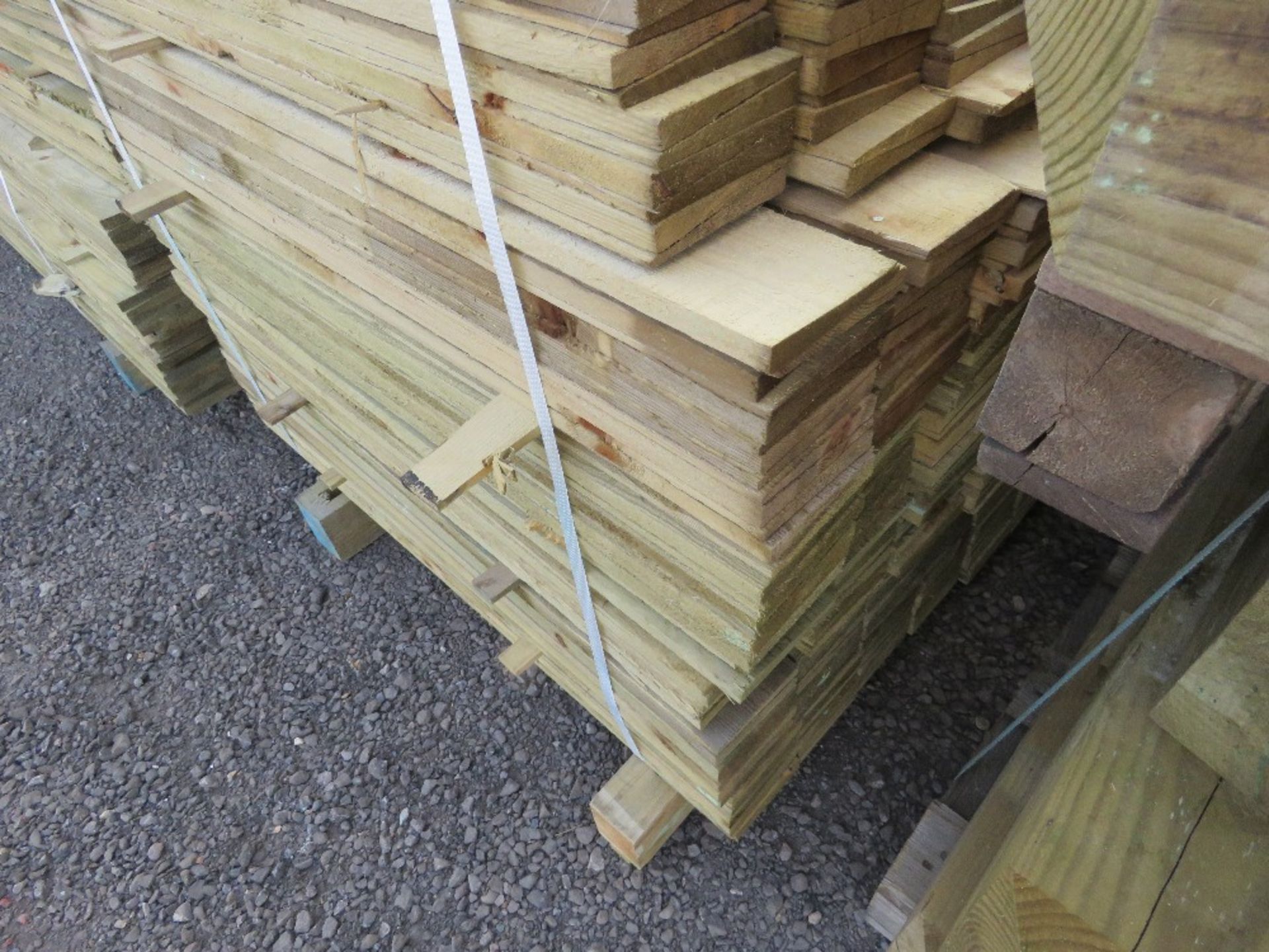 PACK OF PRESSURE TREATED FEATHER EDGE FENCE CLADDING BOARDS. 0.9M LENGTH X 100MM WIDTH APPROX. - Image 2 of 2